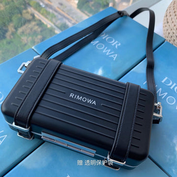 RIMOWA 20 CASE BAG IN BLACK ALUMINUM MAGNESIUM House Of Sarah