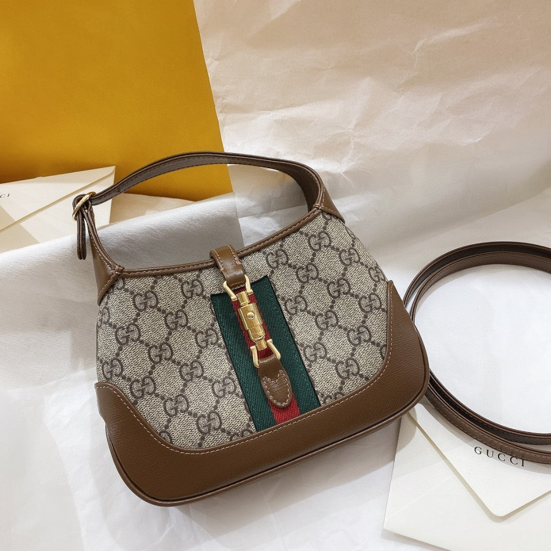 JACKIE 1961 MINI 19 SHOULDER BAG IN BEIGE CANVAS AND BROWN CALFSKIN House Of Sarah