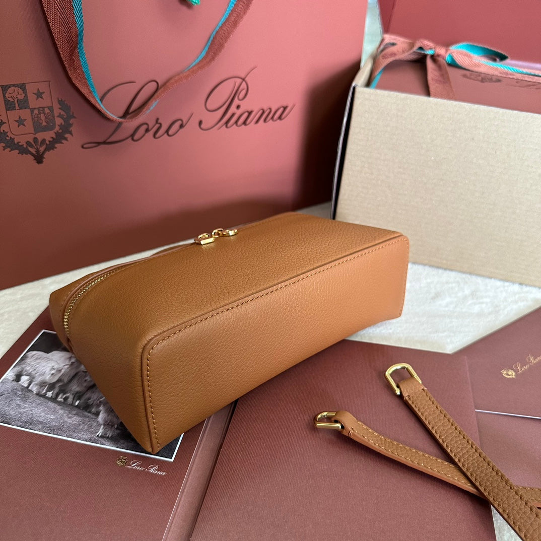 EXTRA POCKET L19 IN BRONZE BROWN GRAINED CALFSKIN WITH GOLD HARDWARE by House Of Sarah