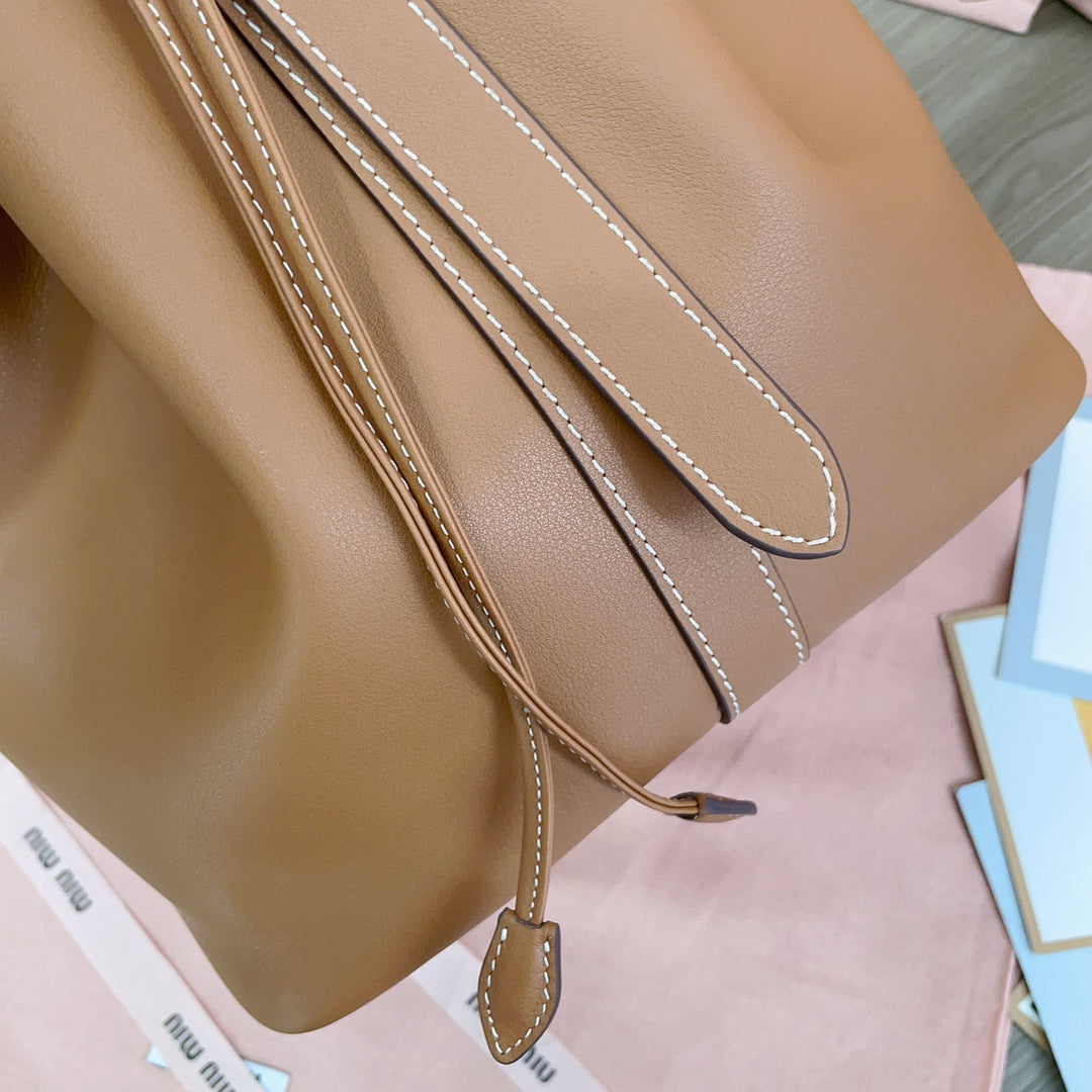 BUCKET BAG 29 IN BRONZE BROWN CALFSKIN House Of Sarah