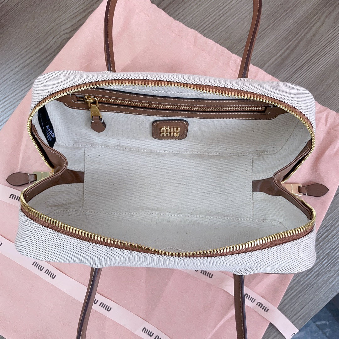 BOWLING BAG 28 IN WHITE CANVAS AND BROWN CALFSKIN TRIM By House Of Sarah
