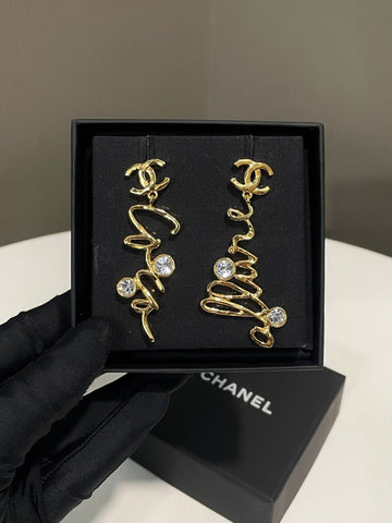 Chanel 24S “Coco" Script Dangling Earrings