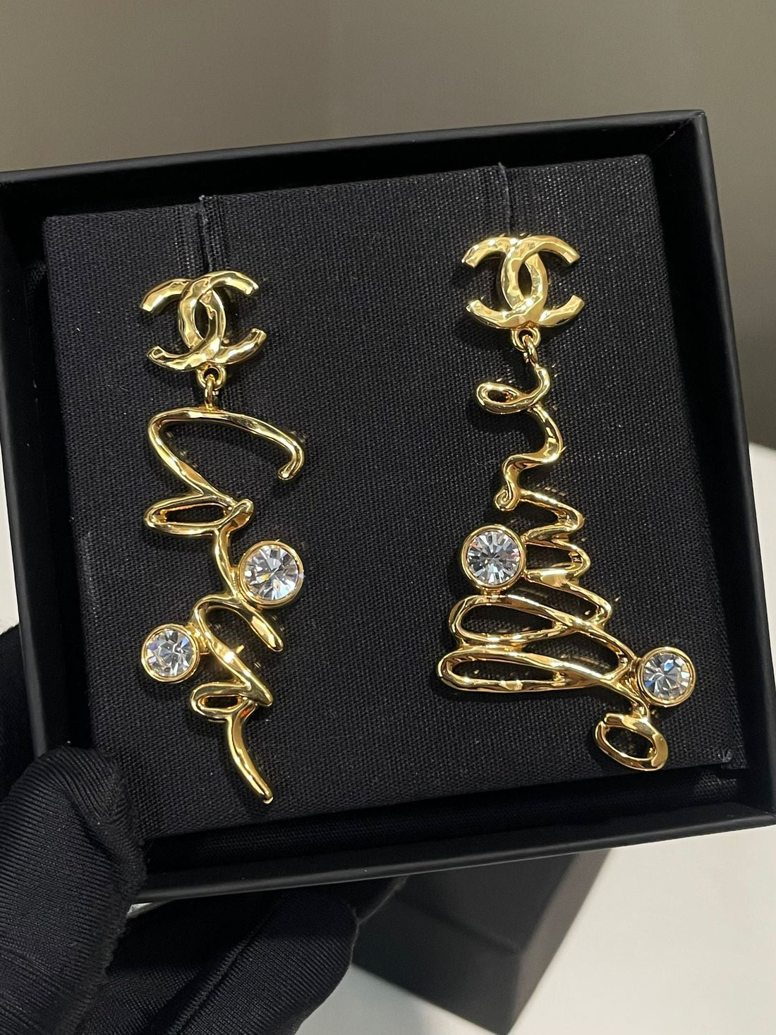 Chanel 24S “Coco" Script Dangling Earrings