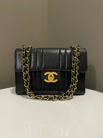 Chanel   XL CC Vertical Flap Black Caviar