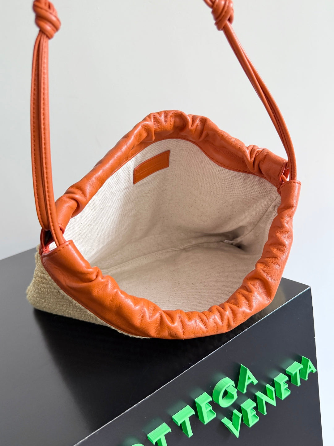 BOTTEGA VENETA 25S DUSTBAG 32 IN BURNT ORANGE RAFFIA AND CALFSKIN by House Of Sarah