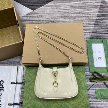 JACKIE NOTTE MINI BAG 19 IN WHITE CRACKED LACQUER CALFSKIN GOLD HARDWARE by House Of Sarah