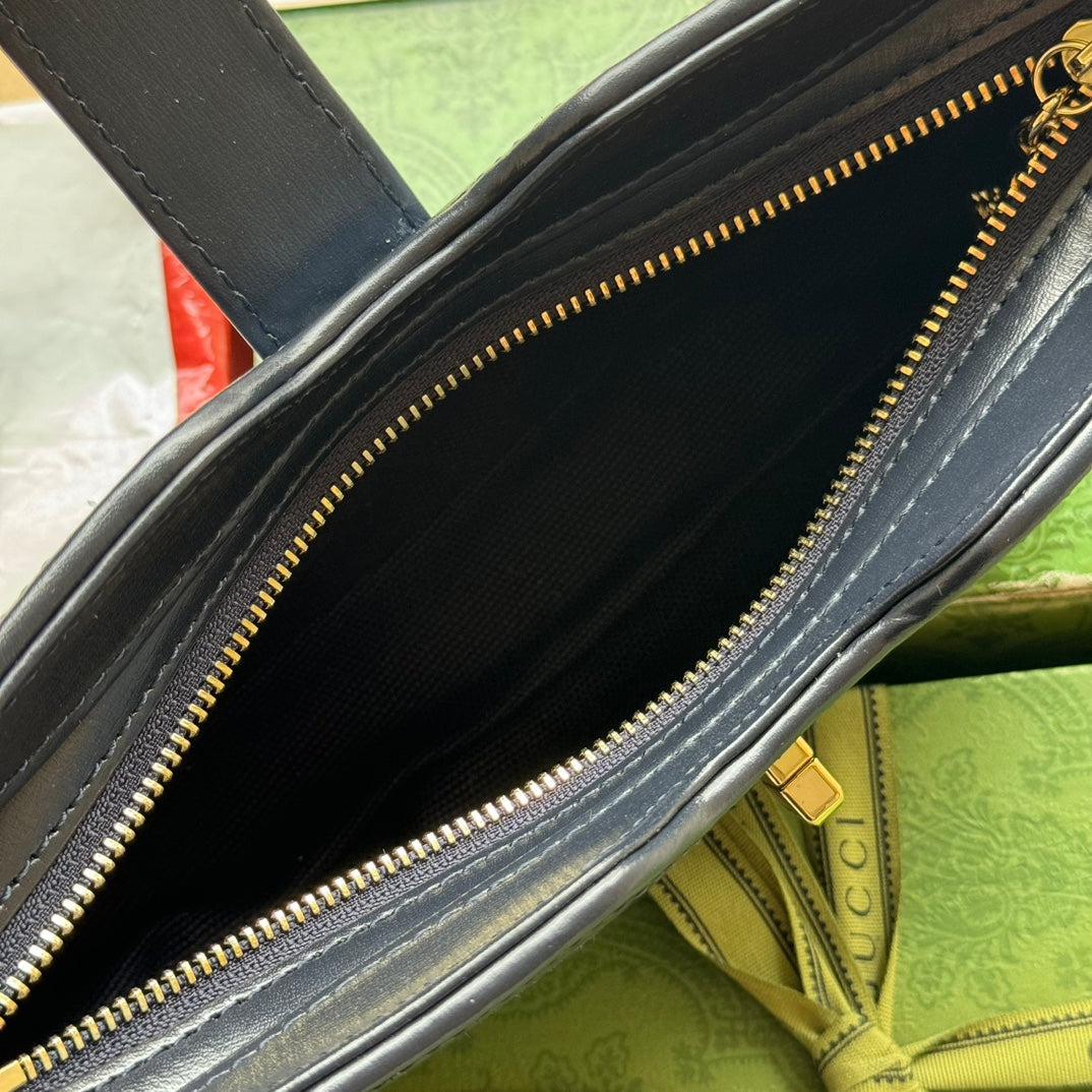 MOON SIDE SHOULDER BAG 24 IN BLUE EMBOSSED DENIM AND BLACK CALFSKIN TRIM GOLD HARDWARE by House Of Sarah