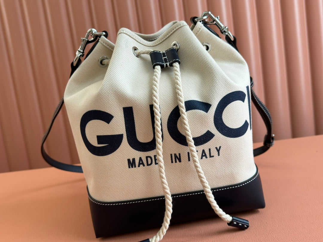 DRAWSTRING SHOULDER BAG LOGO PRINT 31 IN WHITE CANVAS DARK BLUE CALFSKIN House Of Sarah