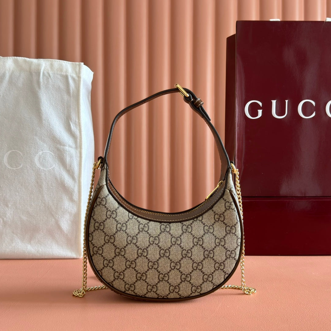 GG SUPREME SHOULDER BAG 22 BROWN IN CANVAS GOLD HARDWARE by House Of Sarah