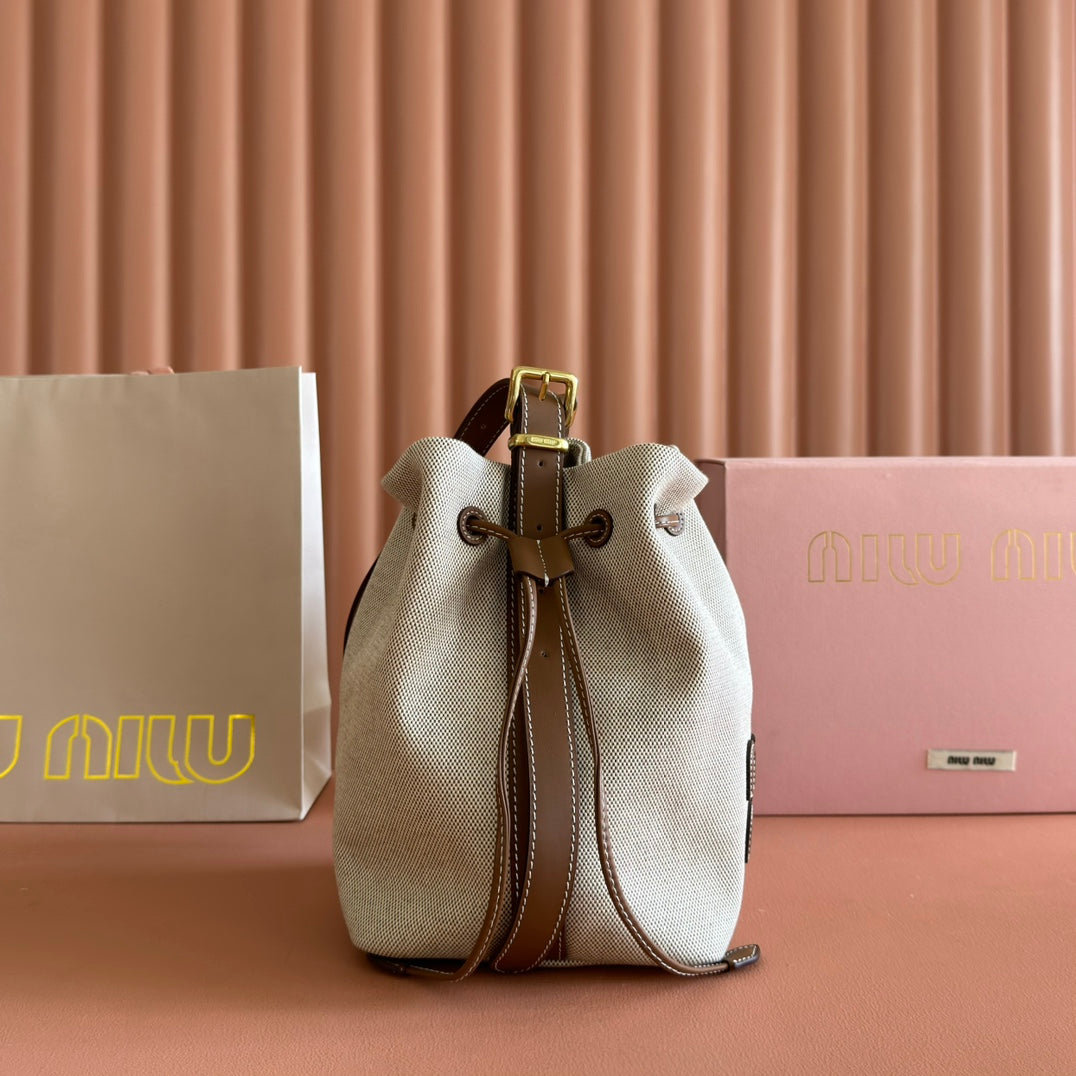 BUCKET BAG 22 BEIGE AND  Y IN CANVAS