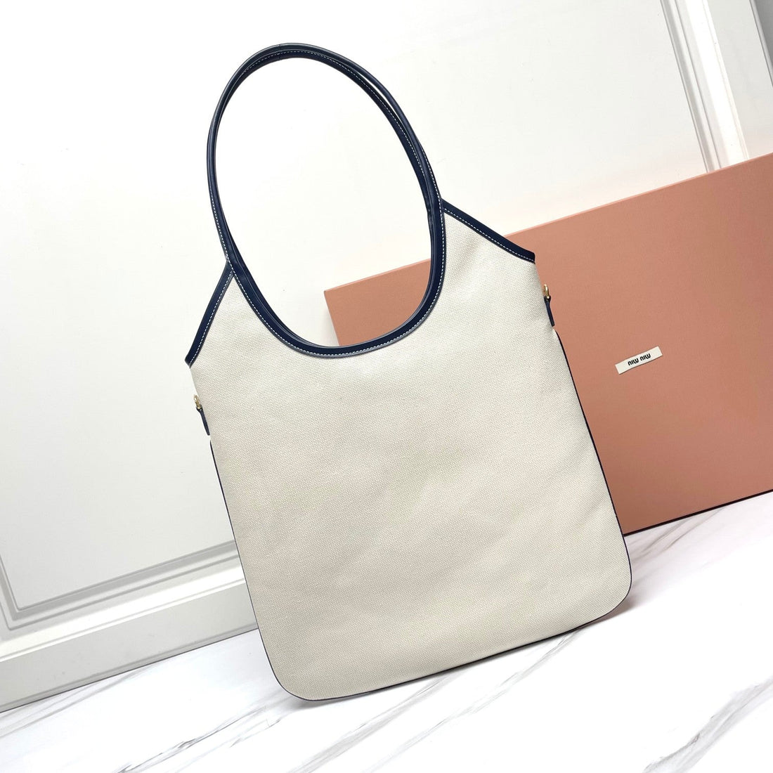 IVY TOTE BAG 40 IN WHITE CANVAS AND NAVY LEATHER TRIM By House Of Sarah